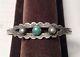 A Vintage Sterling Silver Fred Harvey Cuff Bracelet With A Turquoise Cabochon