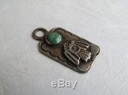Classic old Fred Harvey thunderbird sterling silver turquoise charm