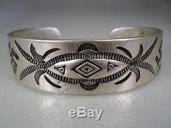 EARLY 1920s HM Fred Harvey Era NAVAJO STAMPED SILVER BRACELET with Whirling Logs