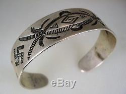 EARLY 1920s HM Fred Harvey Era NAVAJO STAMPED SILVER BRACELET with Whirling Logs