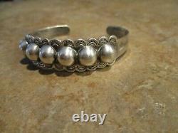 Exceptional OLD Fred Harvey Era Navajo INDIAN HANDMADE Coin Silver Dome Bracelet