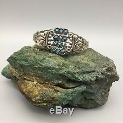 Fred Harvey Era Silver Bracelet With Snake Eye Turquoise Cuts in this Bracelet