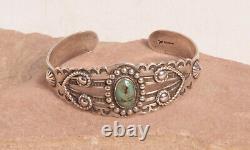 Fred Harvey Style Silver Navajo Bracelet with One Green Turquoise Stone c. 1920s