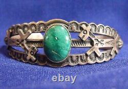 Fred Harvey sterling silver cuff bracelet with applied horses & green turquoise