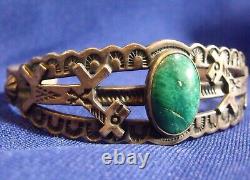 Fred Harvey sterling silver cuff bracelet with applied horses & green turquoise