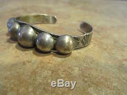 Old Fred Harvey Era Navajo Sterling Silver Dome Bracelet with Clouds / Arrows