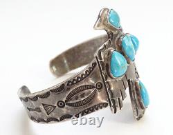Ancien bracelet manchette en turquoise et argent sterling fait à la main par les Navajos avec un oiseau-tonnerre, de l'époque Fred Harvey.