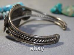 Bracelet manchette en argent sterling avec des fleurs en turquoise Royston naturelle des années 1970 Navajo