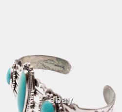 Bracelet manchette en argent sterling avec turquoise Navajo estampillé Fred Harvey.