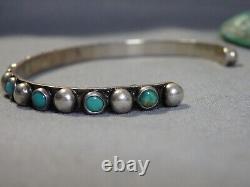 Ère Fred Harvey ZUNI Nevada TURQUOISE Bracelet en argent de monnaie aux yeux de serpent et aux nombreux yeux