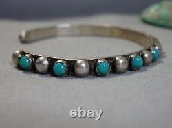 Ère Fred Harvey ZUNI Nevada TURQUOISE Bracelet en argent de monnaie aux yeux de serpent et aux nombreux yeux