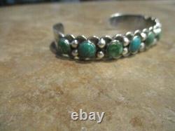 Fabuleux Vieux Fred Harvey Era Navajo Sterling Silver Eight Turquoise Row Bracelet